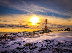 Zachód słońca, Latarnia morska Eigerøy Lighthouse, Wyspa Eigerøya, Norwegia, Zima